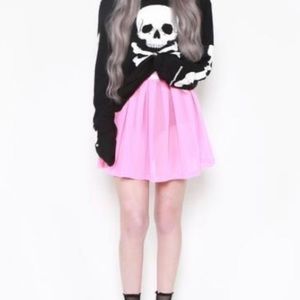 Iron Fist pink behind the pew mesh skirt